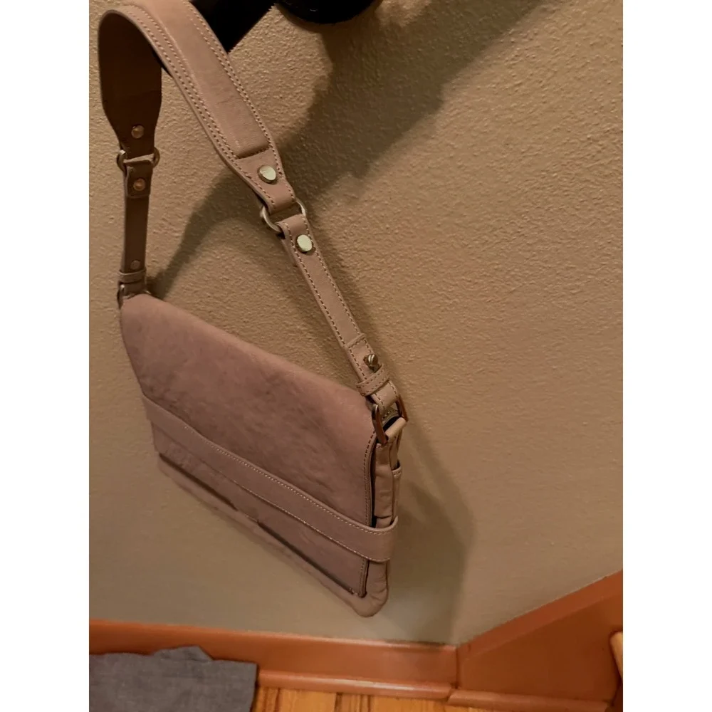 Beautiful Cream leather clutch with detachable shoulder strap by Kenneth Cole
